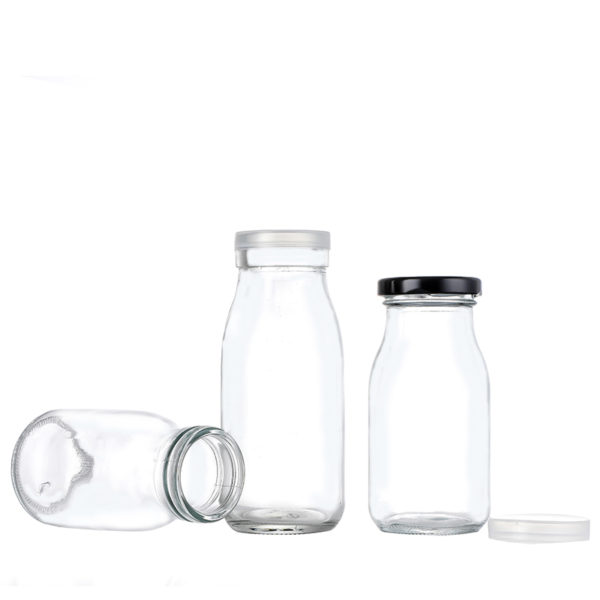 Factory wholesale round shape cold pressed juice glass bottles